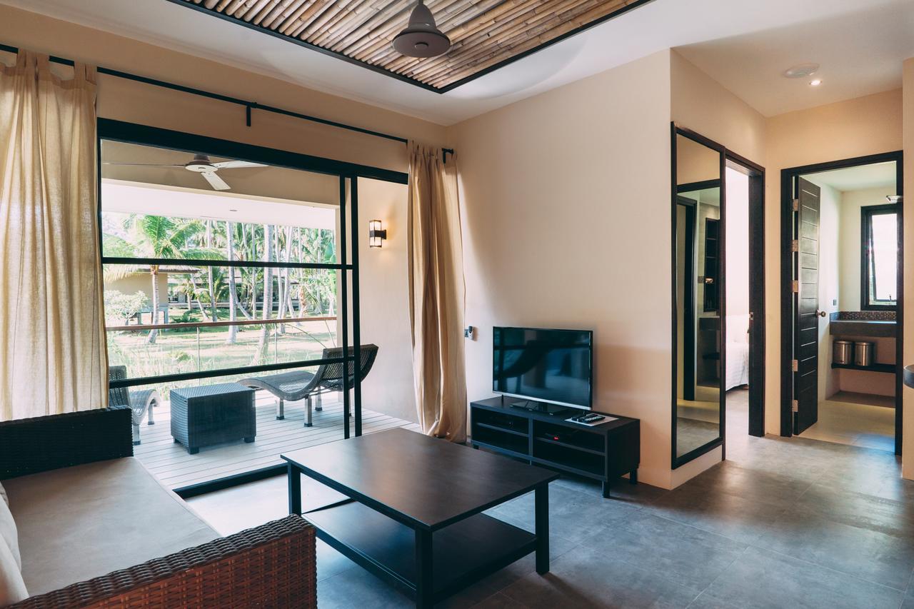 Le Motu Hotel Taling Ngam Beach Exterior foto