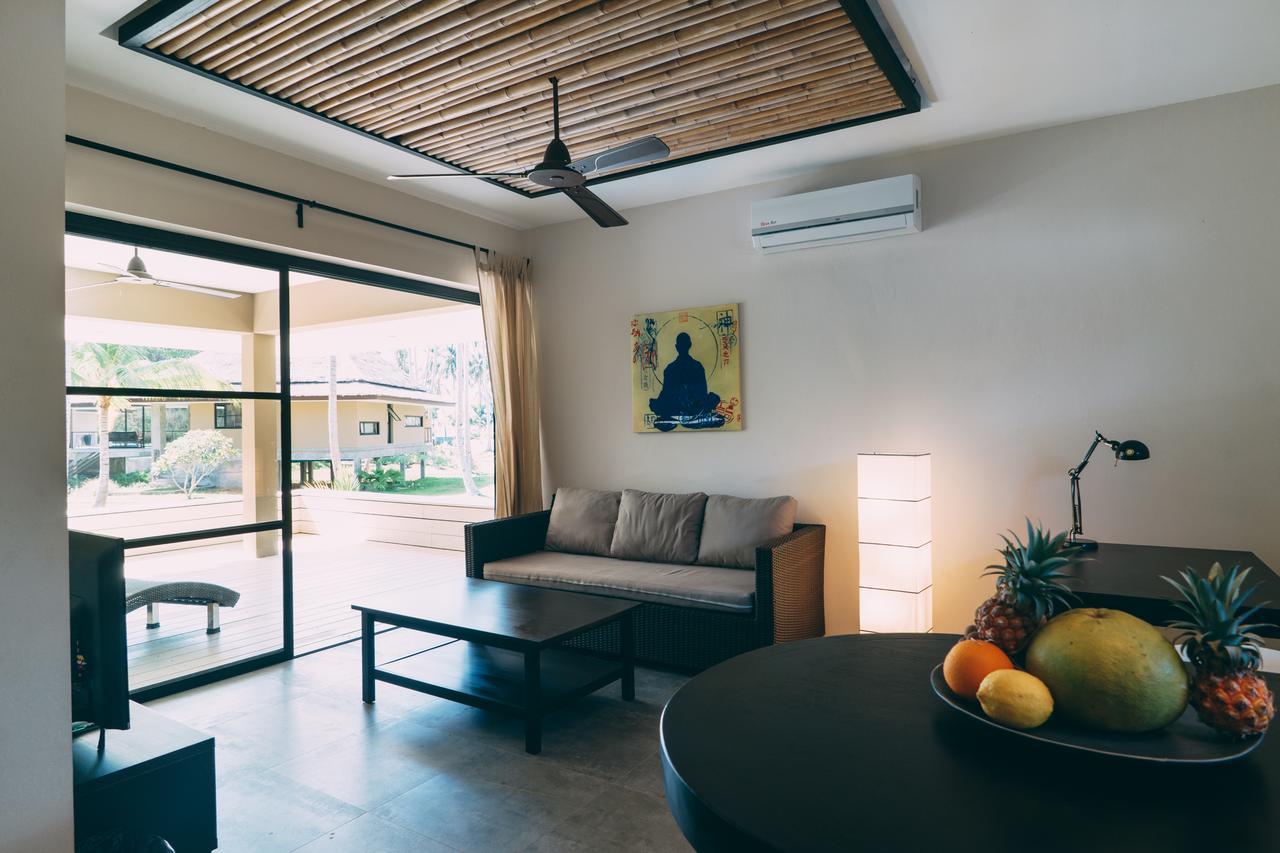 Le Motu Hotel Taling Ngam Beach Exterior foto