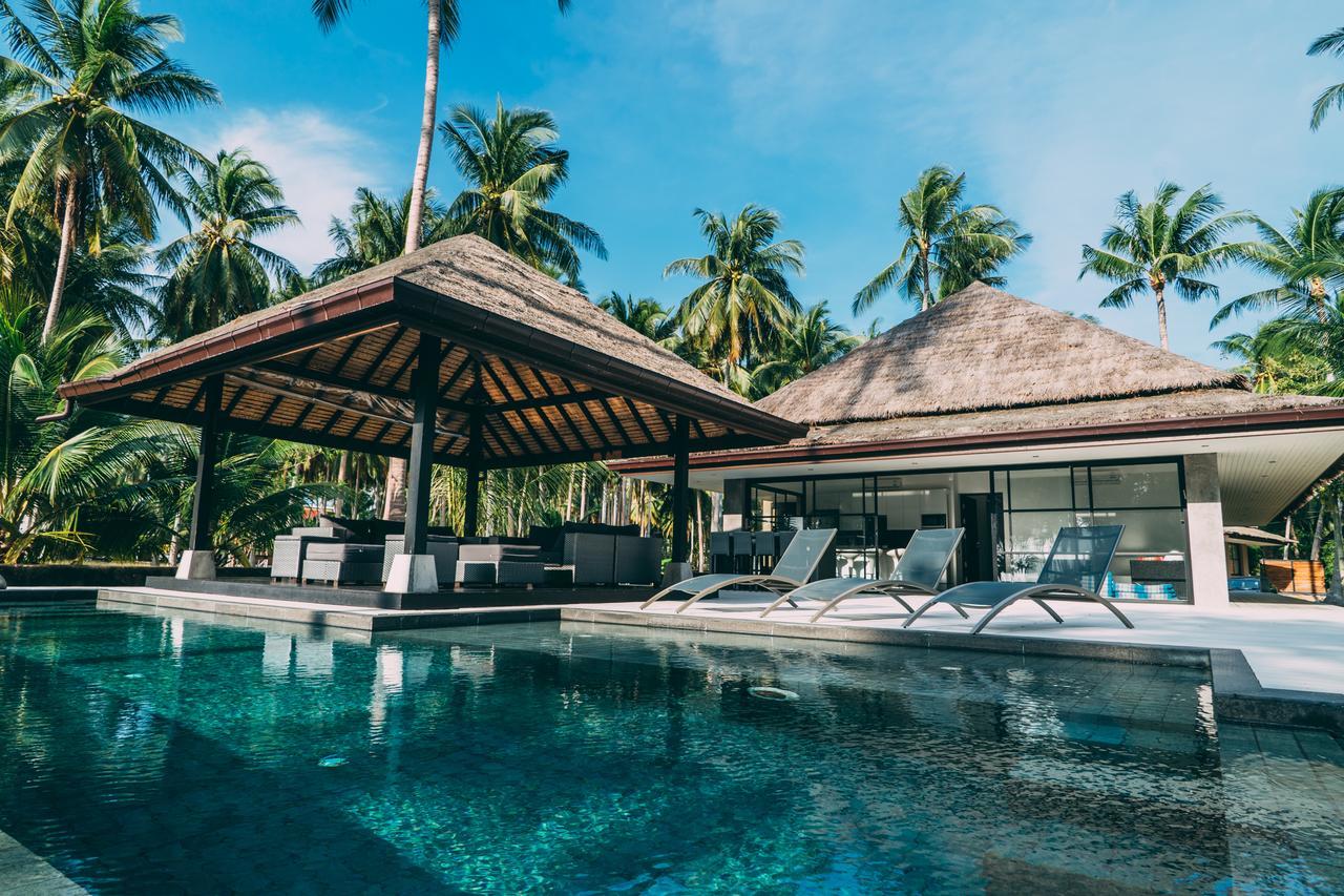 Le Motu Hotel Taling Ngam Beach Exterior foto