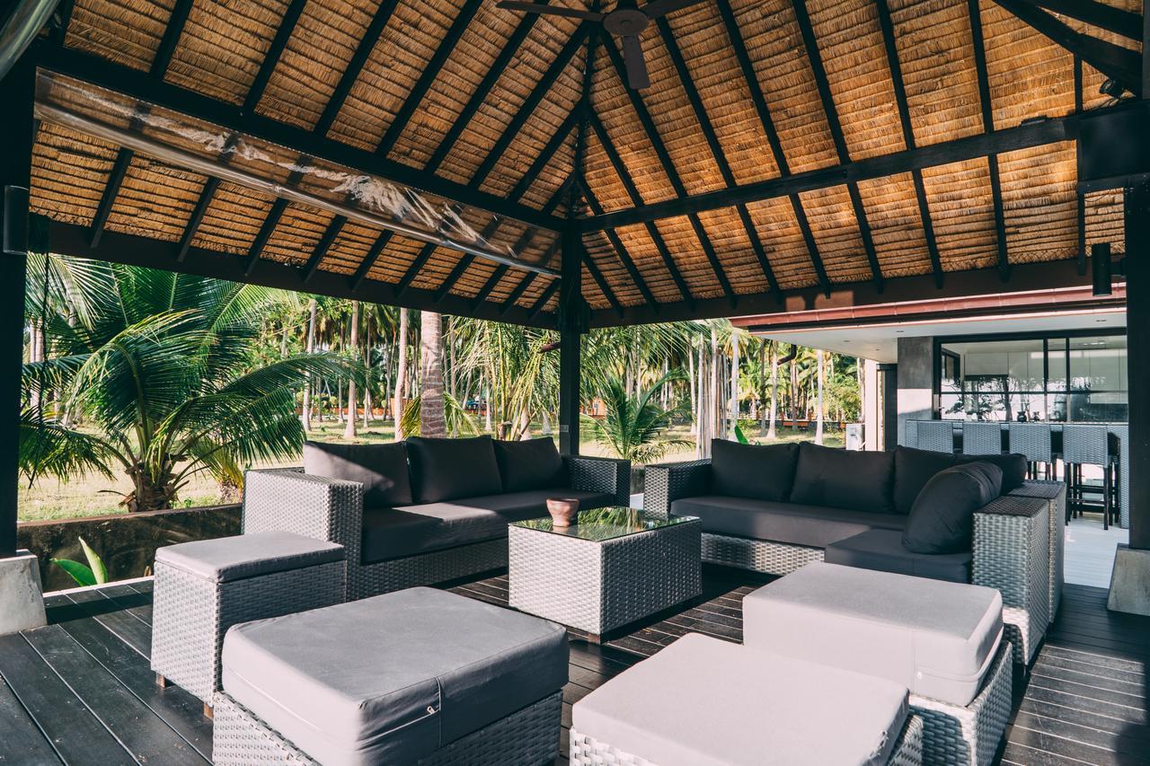 Le Motu Hotel Taling Ngam Beach Exterior foto