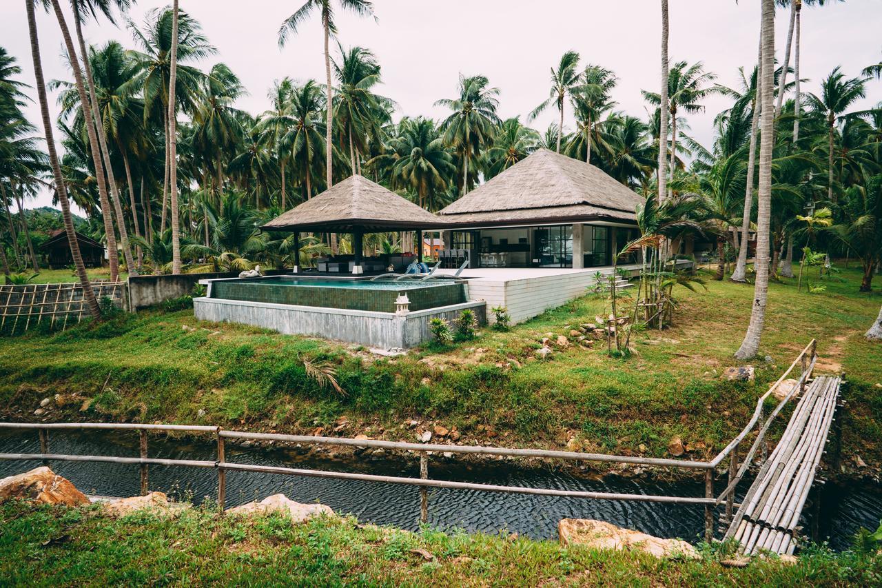 Le Motu Hotel Taling Ngam Beach Exterior foto