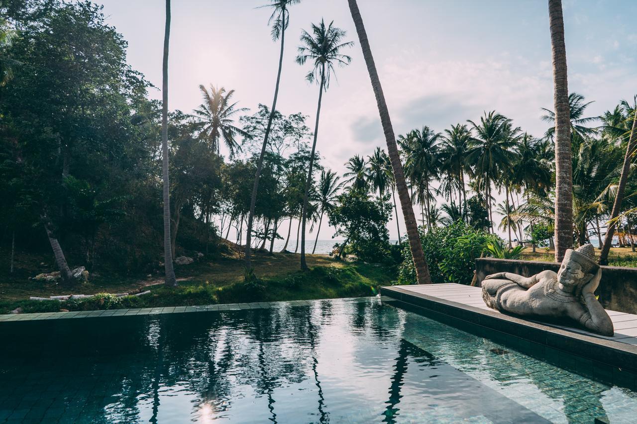 Le Motu Hotel Taling Ngam Beach Exterior foto