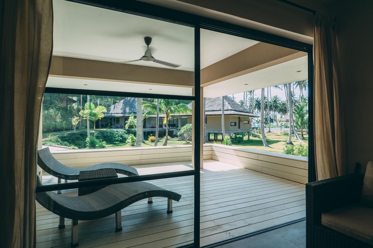 Le Motu Hotel Taling Ngam Beach Exterior foto