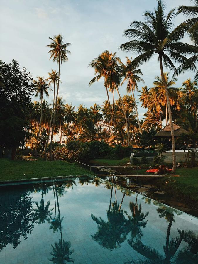Le Motu Hotel Taling Ngam Beach Exterior foto